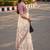 cream ethnic motifs printed pure cotton saree