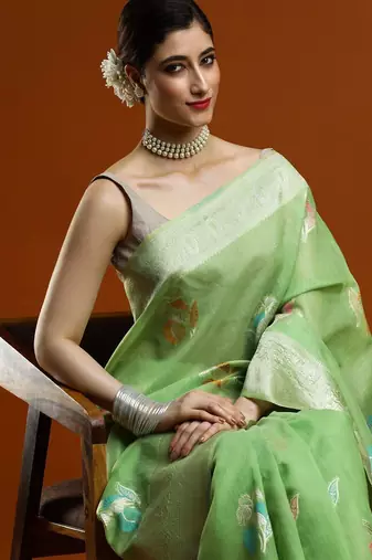 green ethnic motifs embroidered zari embroidered cotton saree