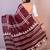 maroon batik printed saree with blouse piece