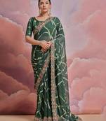 green tie and dye sequinned embroidered saree