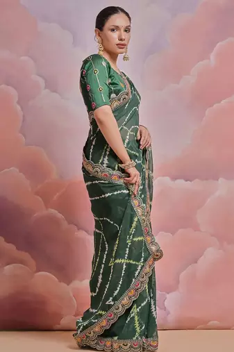 green tie and dye sequinned embroidered saree