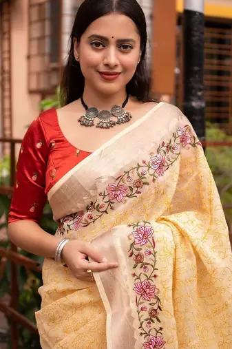 yellow yellow floral embroidered zari linen saree