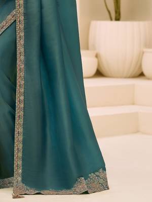 teal teal green tissue ethnic embellished festive wear matching blouse sarees 4