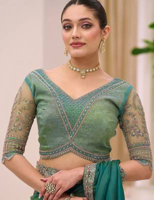 teal teal green tissue ethnic embellished festive wear matching blouse sarees 5