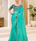 turquoise turquoise tissue ethnic embellished festive wear matching blouse sarees