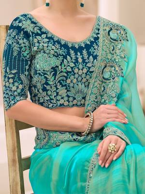 turquoise turquoise tissue ethnic embellished festive wear matching blouse sarees 4