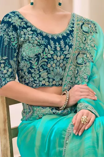 turquoise turquoise tissue ethnic embellished festive wear matching blouse sarees