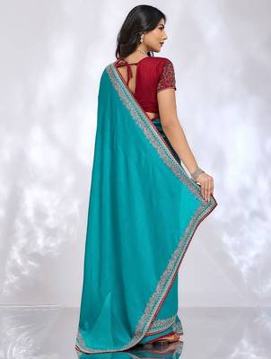 teal embellished embroidered silk blend heavy work saree 3