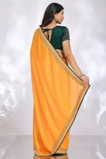yellow floral embroidered silk blend heavy work saree