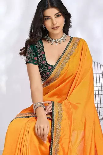 yellow floral embroidered silk blend heavy work saree