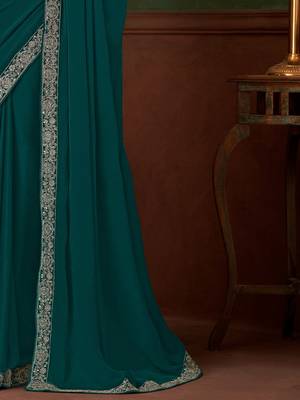 teal sequinned pure chiffon celebrity saree 5