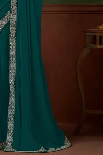 teal sequinned pure chiffon celebrity saree