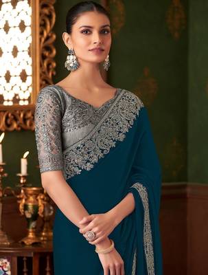 teal sequinned pure chiffon saree 3