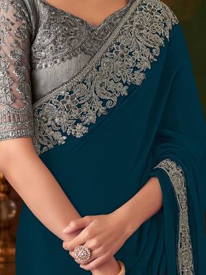 teal sequinned pure chiffon saree 4