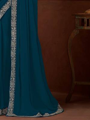 teal sequinned pure chiffon saree 5