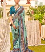 green ethnic motifs woven design zari patola saree