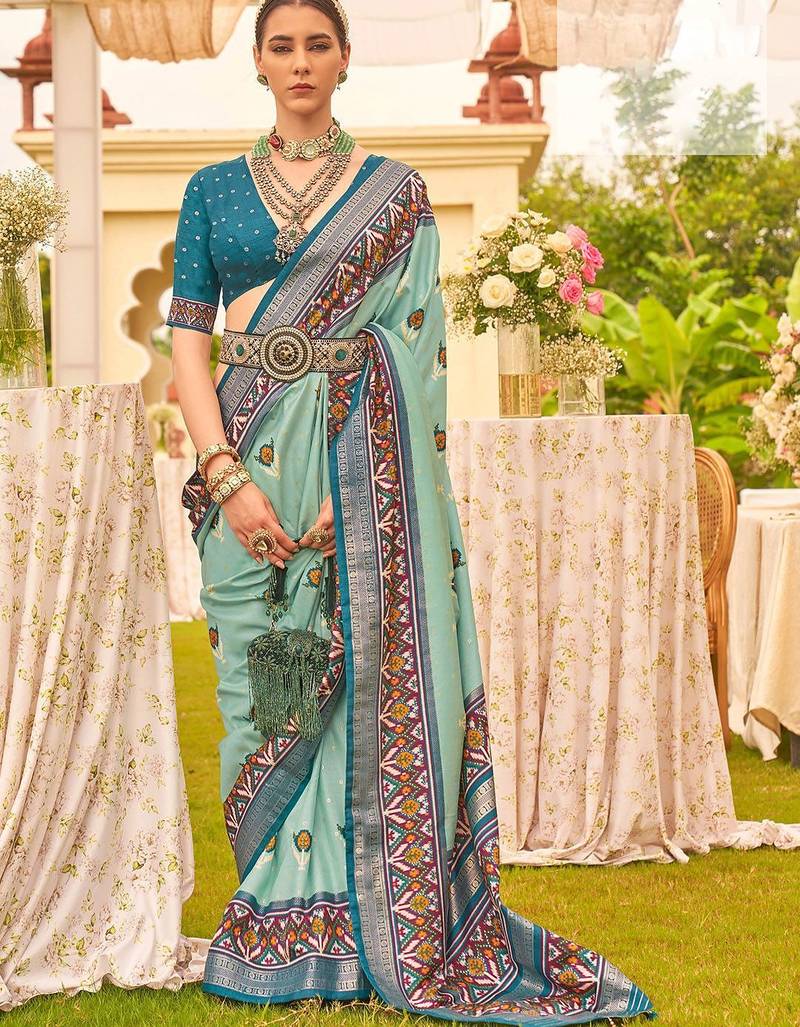 green ethnic motifs woven design zari patola saree