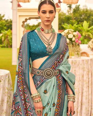 green ethnic motifs woven design zari patola saree 2