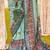 green ethnic motifs woven design zari patola saree