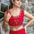 red woven design embroidered satin saree