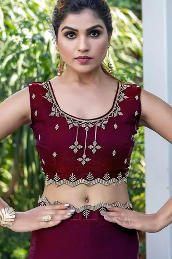 maroon woven design embroidered satin saree