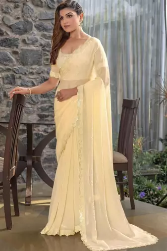 cream woven design embroidered satin saree