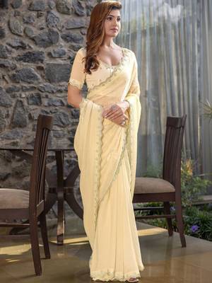 cream woven design embroidered satin saree 3