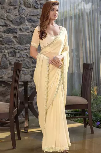 cream woven design embroidered satin saree