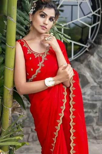 red woven design embroidered satin saree