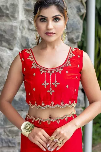 red woven design embroidered satin saree