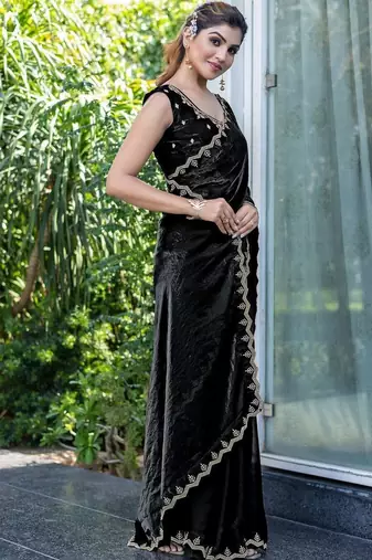 black woven design embroidered satin saree