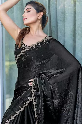 black woven design embroidered satin saree