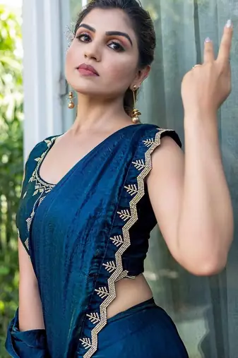 teal woven design beads and stones satin saree