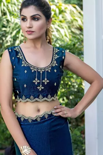teal woven design beads and stones satin saree