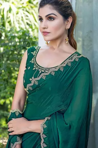 green woven design beads and stones satin saree