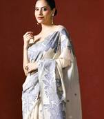 cream floral printed woven design saree