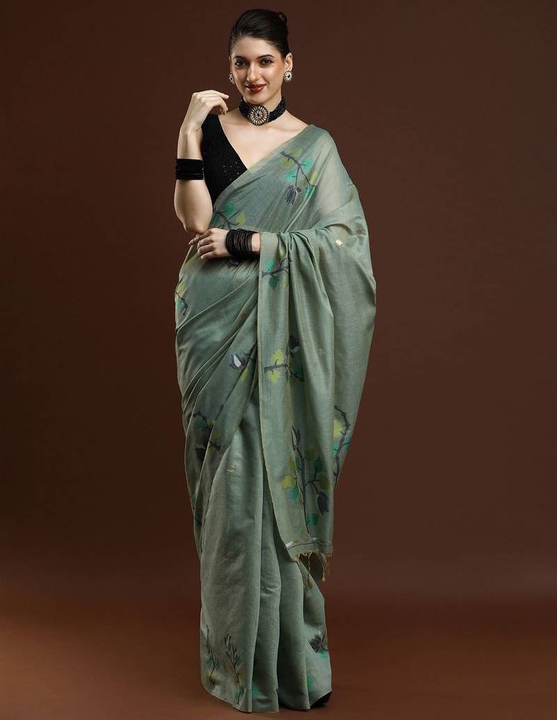 green woven design zari muga saree