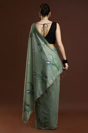 green woven design zari muga saree