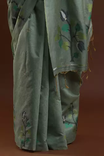 green woven design zari muga saree