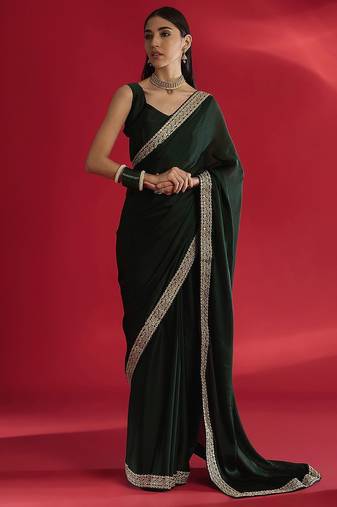 green sequinned satin saree