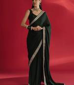 green sequinned satin saree