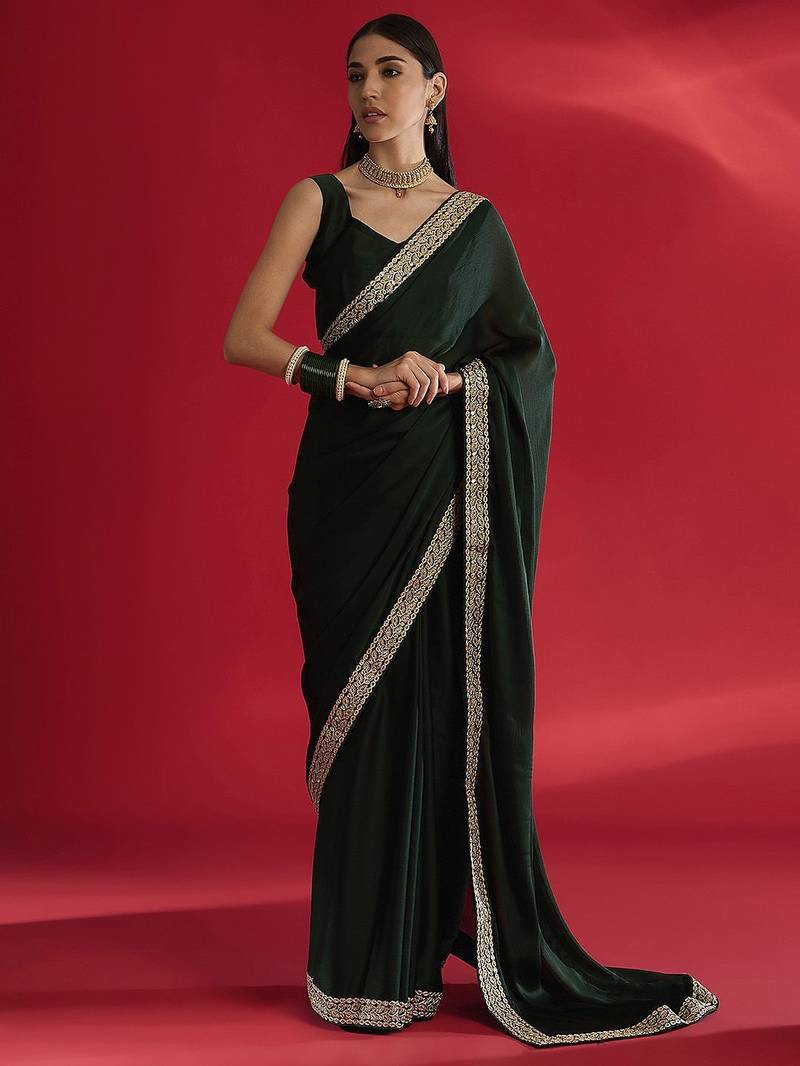 green sequinned satin saree