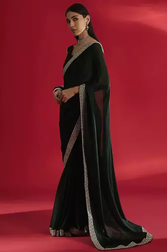 green sequinned satin saree