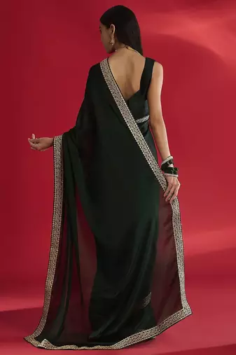 green sequinned satin saree