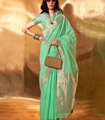 sea_green woven design zari poly linen banarasi saree