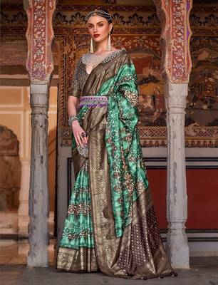 Lavender sea green sea green floral woven designed zari saree 1