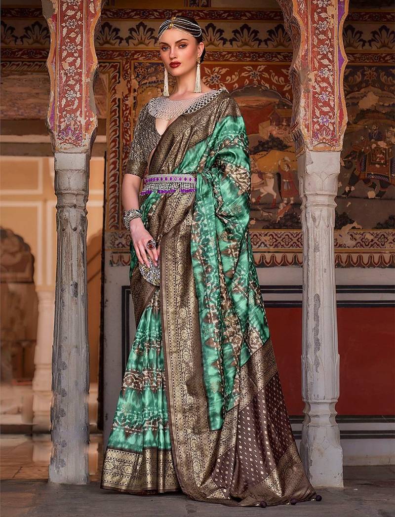 Lavender sea green sea green floral woven designed zari saree