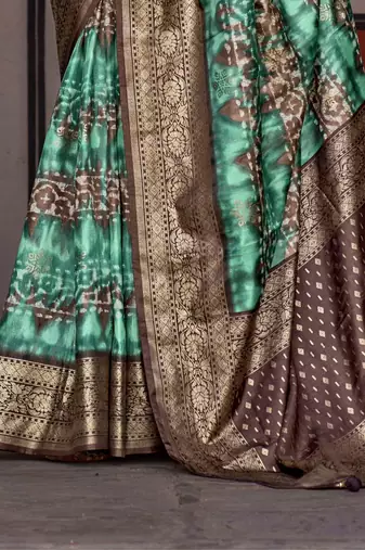 Lavender sea green sea green floral woven designed zari saree