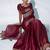 maroon ethnic motifs embroidered organza saree