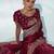 maroon ethnic motifs embroidered organza saree